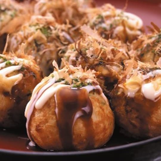 8 unidades de takoyaki com polvo grande